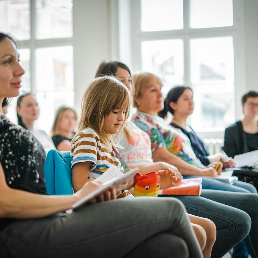 Families gathered for a support group session